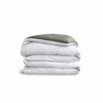 Down for Good Essential duvet cover panels, folded and stacked, in White and Willow organic cotton.