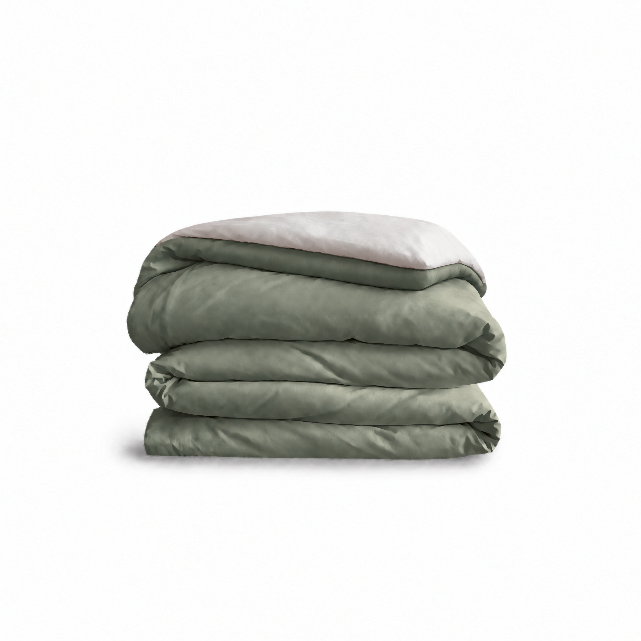 Down for Good Essential duvet cover panels, folded and stacked, in Willow and Shell organic cotton.