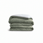 Down for Good Essential duvet cover panels, folded and stacked, in Willow and White organic cotton.