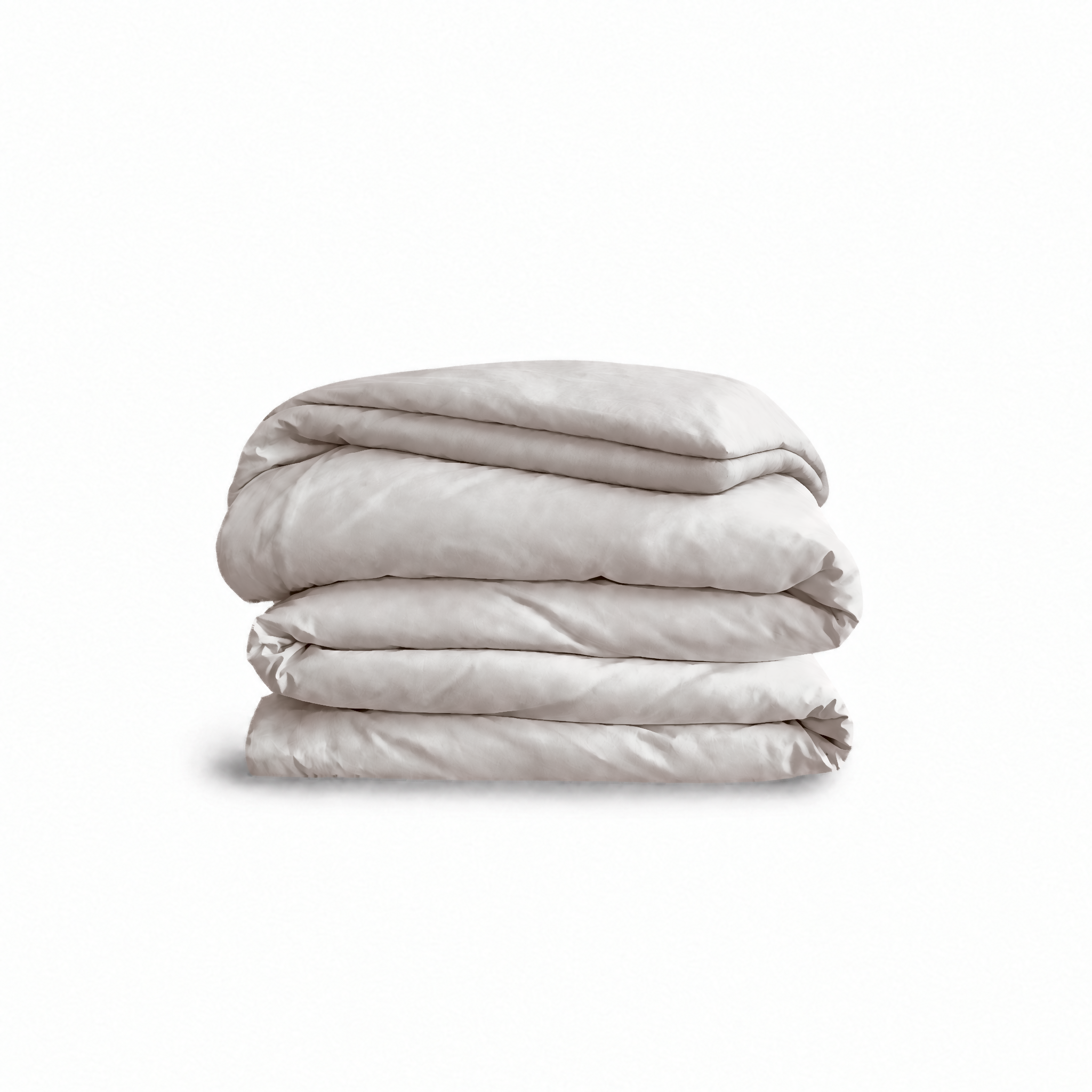 Down for Good Essential duvet cover panels, folded and stacked, in Shell organic cotton.