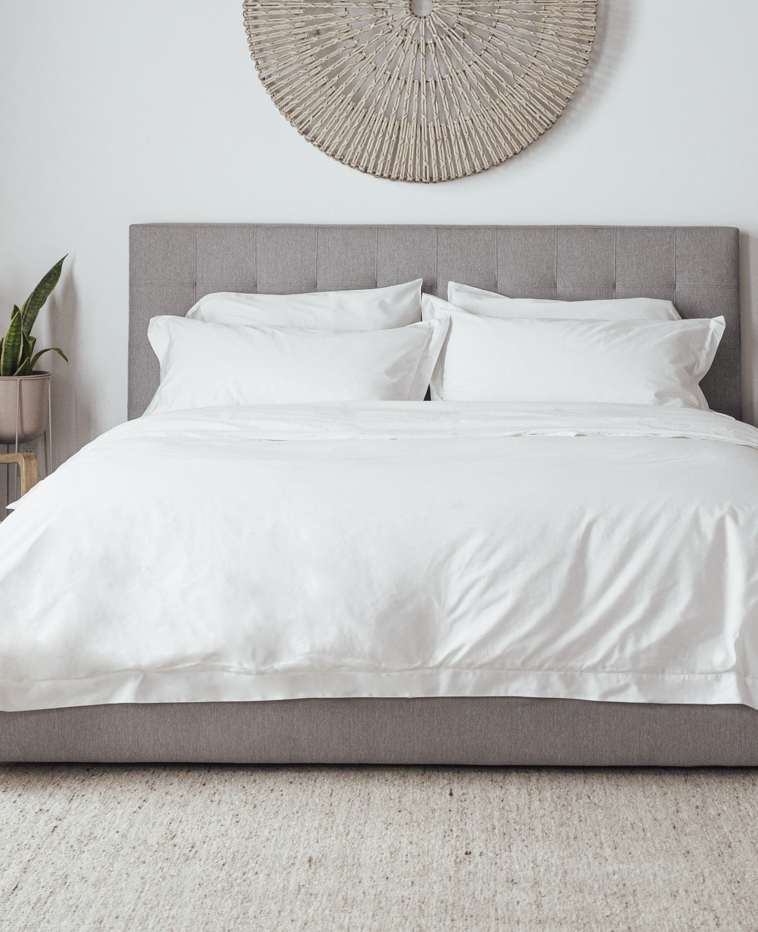 modern bed with reversible, dual sided  pillow shams and white duvet